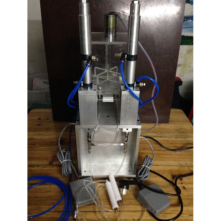 Máquina de llenado manual de doble cabezal CBD